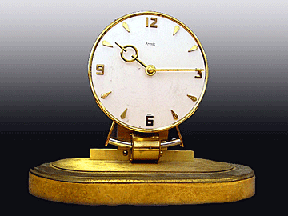 Round brass clock.