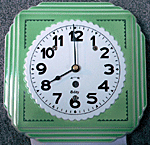 Small green 8-day clock.