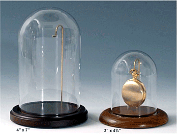 Watch display domes with wire inserts.